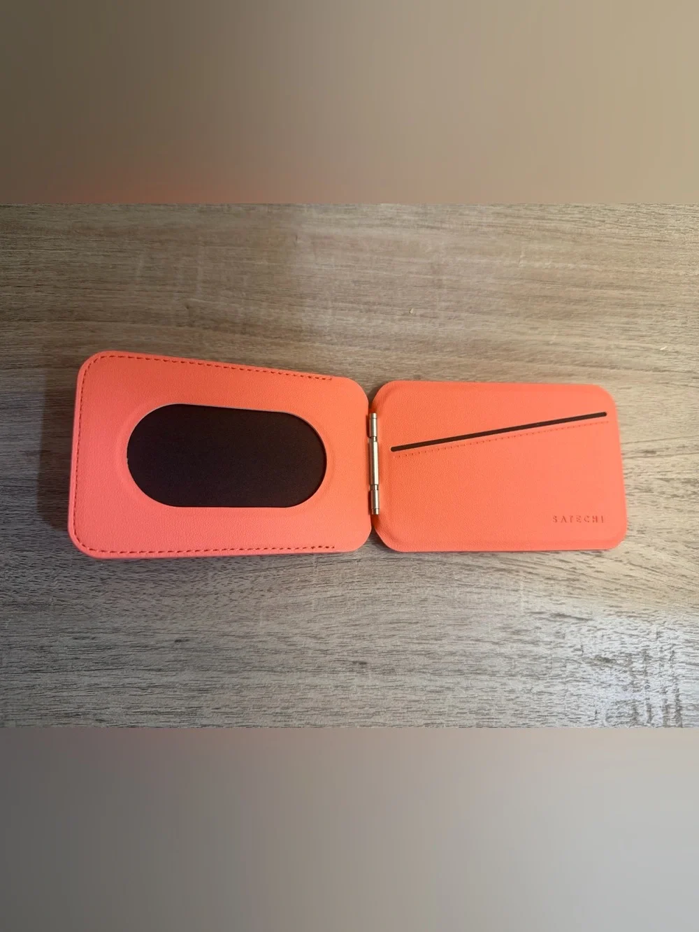 Anker Coral Orange Power Bank, Satechi Magnetic Wallet Stand, and Pop Socket